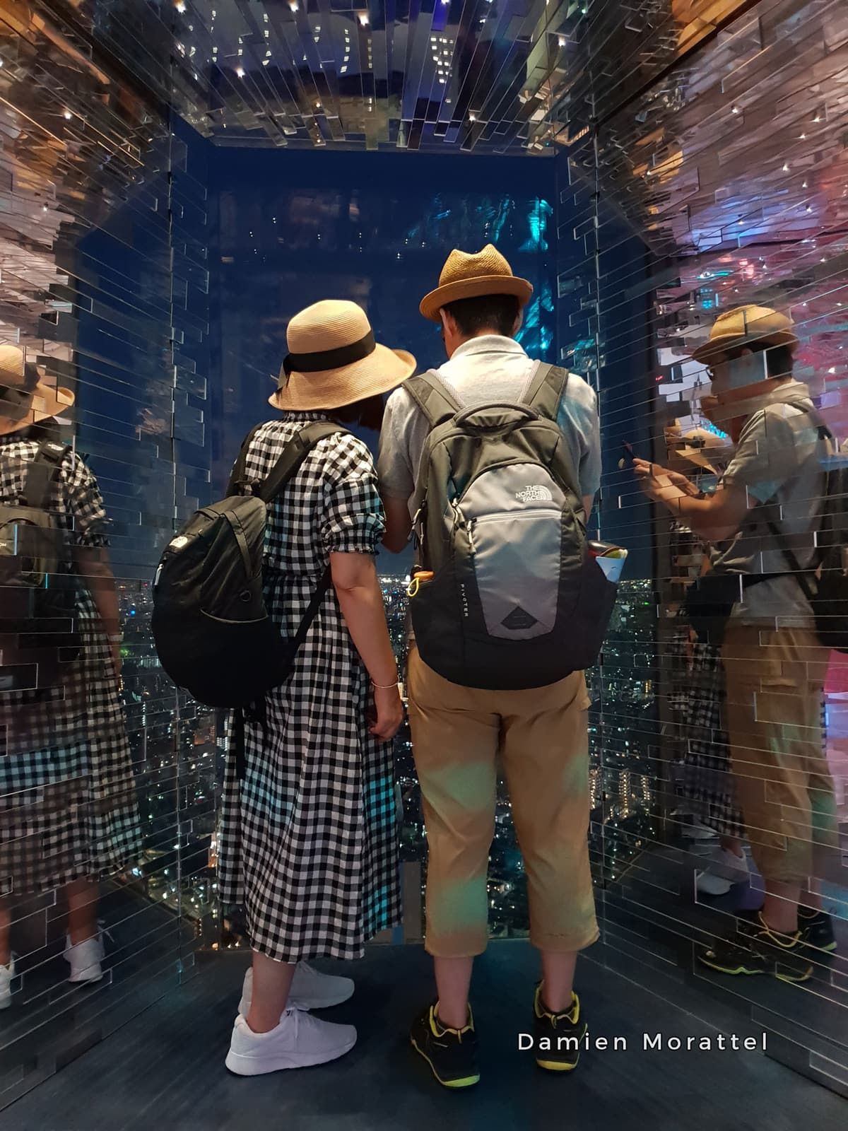 Visitors in front of a light installation