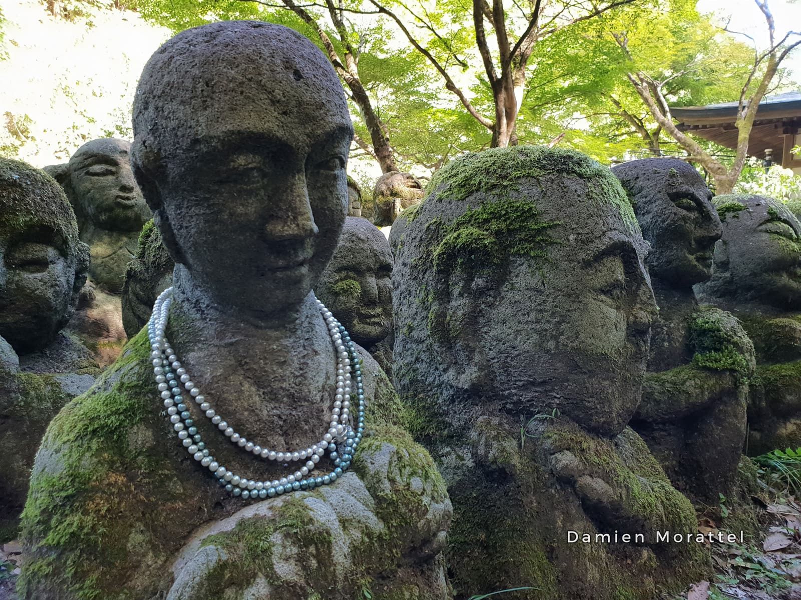 Moss-covered stone statues