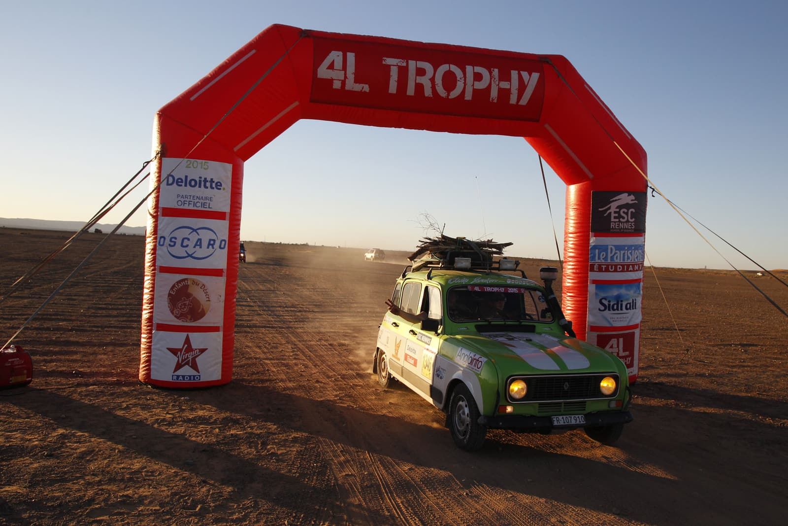 The no. 1346 Renault 4 drives under the 4L Trophy arch