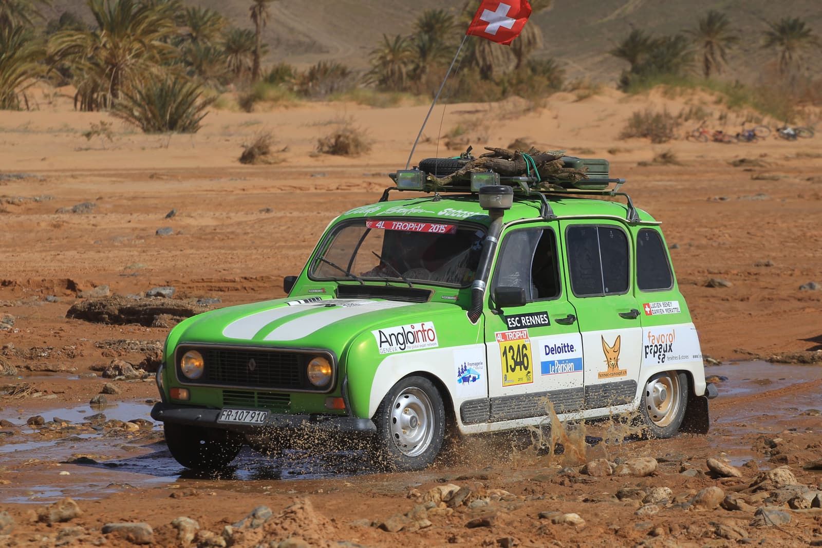 The Renault 4 crossing a muddy puddle